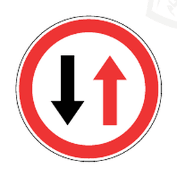 Give way to oncoming traffic — Saudi road sign
